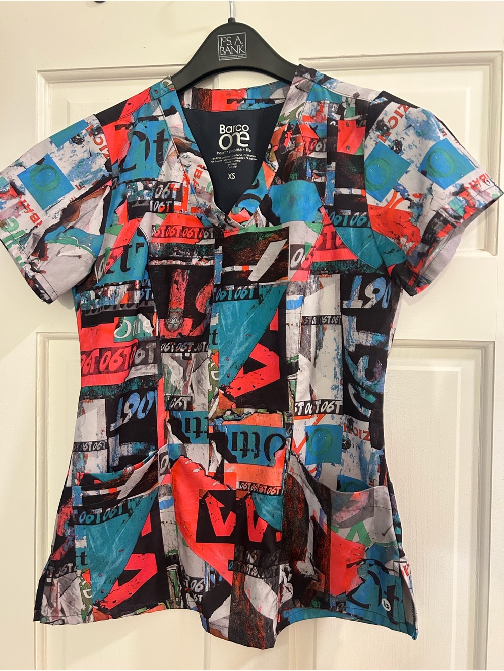 Barco Uniforms Kids Short Sleeve Scrub Top in Teal, Red, Black